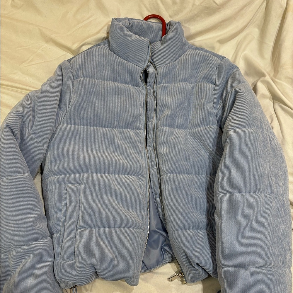 Blue puffer jacket